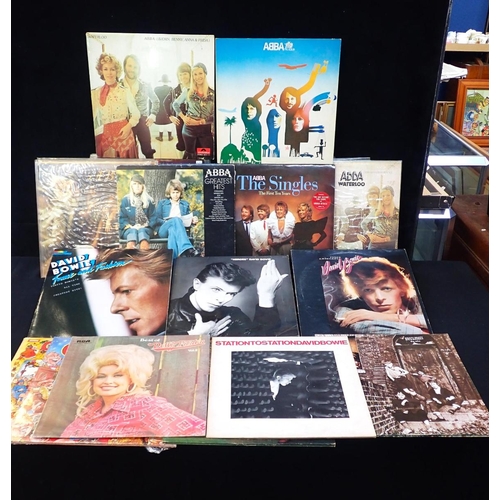 39 - A COLLECTION OF LP VINYL RECORDS including ABBA and David Bowie