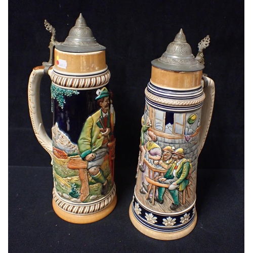 57 - A PAIR OF WEST GERMAN STEINS traditional style with raised decoration, West German marks, 1950s, hei... 