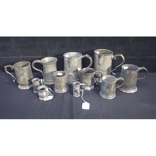 73 - A COLLECTION OF ANTIQUE PEWTER PUB MEASURES including a James Yates quart jug (11)