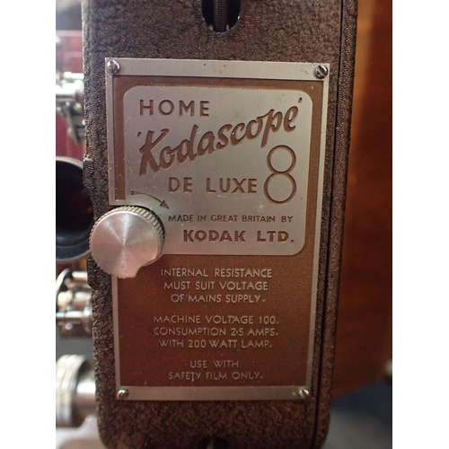 80 - A VINTAGE KODASCOPE 8 DE LUXE PROJECTOR in Art Deco style walnut case