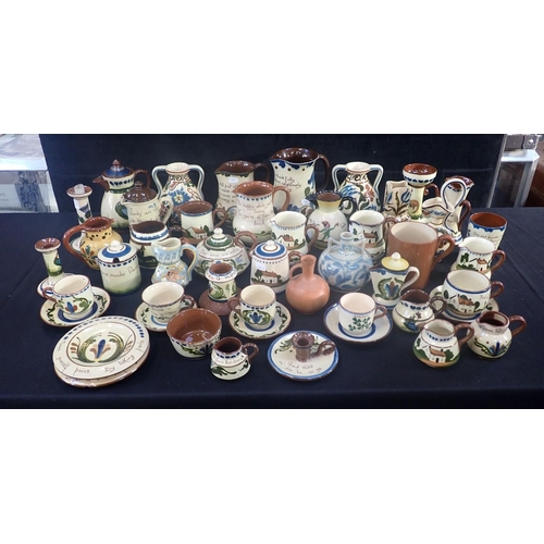 84 - A COLLECTION OF DEVON/TORQUAY POTTERY; ALLER VALE, WATCOMBE etc, slip decorated, some motto ware, ma... 