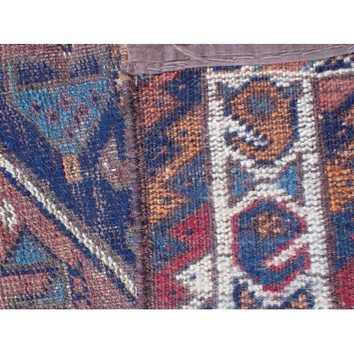 873 - AN ANTIQUE SHIRAZ RUG 118 x 83cm (worn)