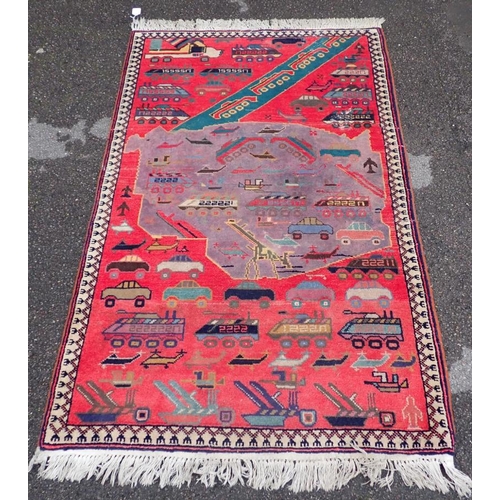 879 - AN AFGHAN 'WAR RUG' WORKED ALL OVER WITH WEAPONS, VEHICLES AND OTHER TOPICAL MOTIFS 97 x 156cm plus ... 