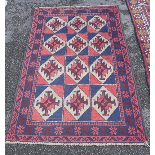 880 - A BELOUCHI PRAYER RUG of stylised Mosque design 142 x 78cm, and another Belouchi rug with lozenge mo... 