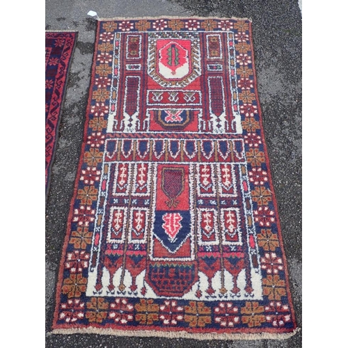 880 - A BELOUCHI PRAYER RUG of stylised Mosque design 142 x 78cm, and another Belouchi rug with lozenge mo... 