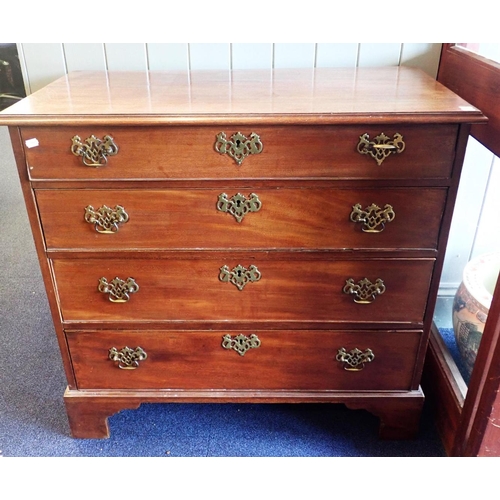 884 - A GEORGE III MAHOGANY CHEST OF FOUR DRAWERS of small proportions, the drawers lined with 1840s newsp... 