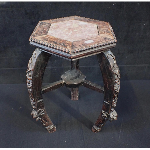 887 - A CHINESE HARDWOOD AND ROUGE MARBLE JARDINIERE STAND with curved and foliate carved legs 44cm high