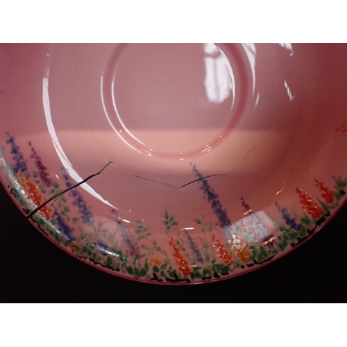 93 - A CARLTON CHINA POTTERY TEA SERVICE decorated on colours with flowers on a pink ground, comprising t... 