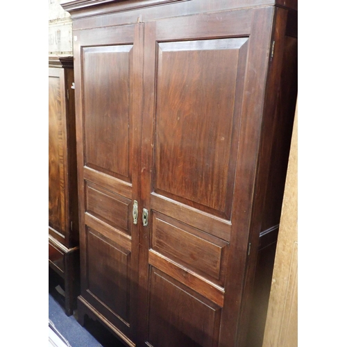 971 - A MAHOGANY CHANNEL ISLANDS TYPE WARDROBE on tall bracket feet, 203cm high,131cm wide (at cornice) 61... 