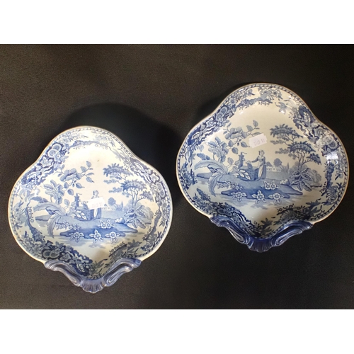 58A - A PAIR OF BLUE AND WHITE PEARLWARE SCALLOP DISHES