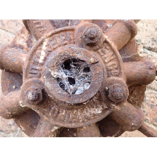 1 - A LARGE IRON WHEEL BY BAMFORDS, UTTOXETER probably from a hay rake or similar agricultural machine 1... 