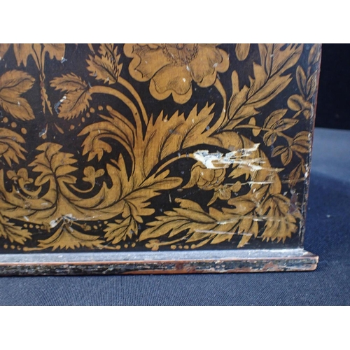 7 - A REGENCY PENWORK DECORATED JEWELLERY CHEST with scrolling foliage and flowers against a black groun... 