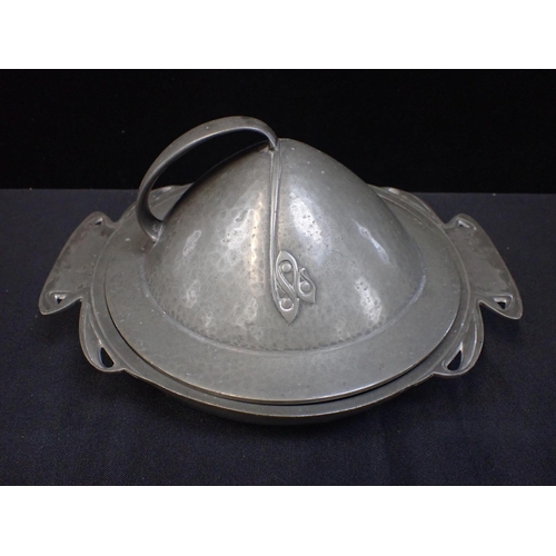 104 - AN ENGLISH PEWTER ART NOUVEAU MUFFIN DISH with asymmetric handle (slightly out of shape, lid not qui... 