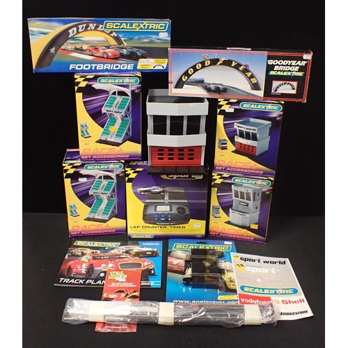 132 - A COLLECTION OF SCALEXTRIC BUILDINGS AND ACCESSORIES plus a lap timer etc.