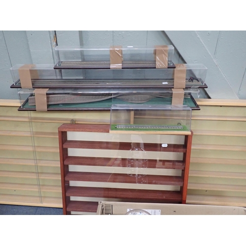 140 - THREE HANGING DISPLAY UNITS FOR MODELS all with sliding glazed fronts, the larger two 104 cms wide, ... 