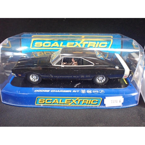 173 - FOUR SCALEXTRIC CARS VW Beetle Black 13, VW Beetle Rusty Yellow, Dodge Charger, Mini Police Car