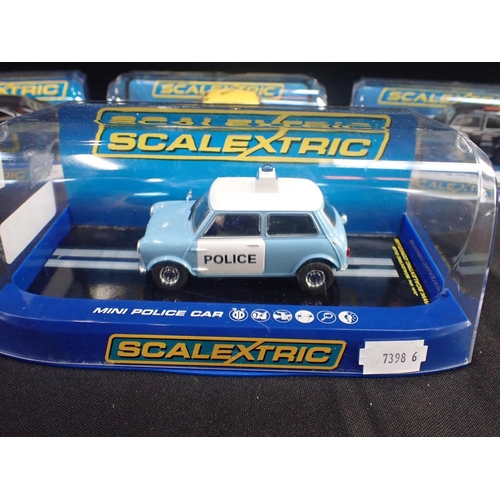 173 - FOUR SCALEXTRIC CARS VW Beetle Black 13, VW Beetle Rusty Yellow, Dodge Charger, Mini Police Car