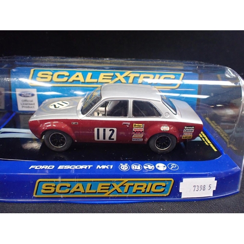 174 - SIX SCALEXTRIC RACING AND RALLY CARS Honda F1 Team x 2, Ford Escort Mk 1, Porche 911, Porche 997, Sk... 