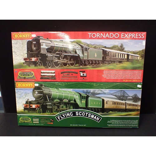 188 - HORNBY 00 GAUGE BOXED TRAIN SETS Flying Scotsman (incomplete) and Tornado Express.