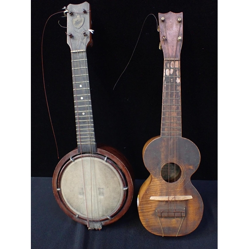 193 - A KAHOLAS AND Co 'UKELELE O HAWAII' with interior label 52cm long, and a Keech banjulele banjo 55cm ... 