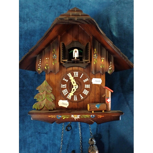 198 - A MODERN SWISS CUCKOO CLOCK with a cased replica sundial compass and a Victorian bookstand. (3)