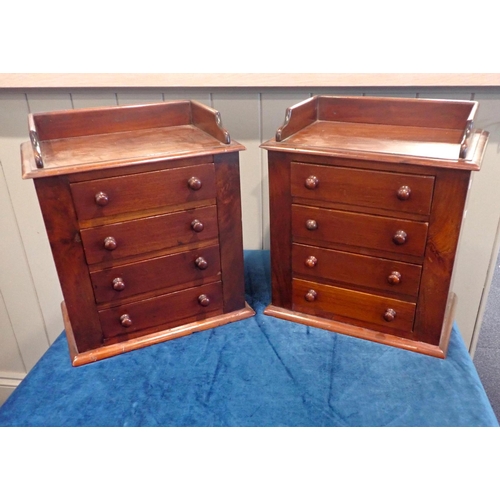 212 - A PAIR OF VICTORIAN STYLE MAHOGANY MINIATURE CHESTS OF DRAWERS each with four drawers, width 34 cms,... 