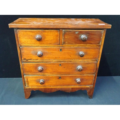 218 - A VICTORIAN MAHOGANY MINIATURE CHEST OF DRAWERS with two short and three long drawers, 41 cms wide, ... 