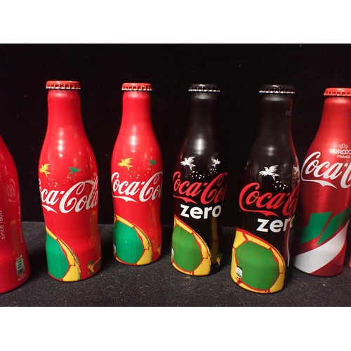 222 - A COLLECTION OF 10 LIMITED EDITION ALUMINIUM COCA COLA BOTTLES including four 2012 Olympic bottles, ... 