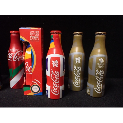 222 - A COLLECTION OF 10 LIMITED EDITION ALUMINIUM COCA COLA BOTTLES including four 2012 Olympic bottles, ... 