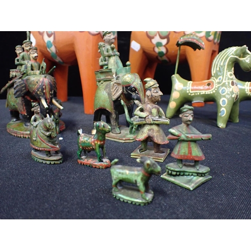 235 - A PAIR OF SWEDISH PAINTED WOOD DALA HORSES 25cm high, together with a set of Indian carved and paint... 