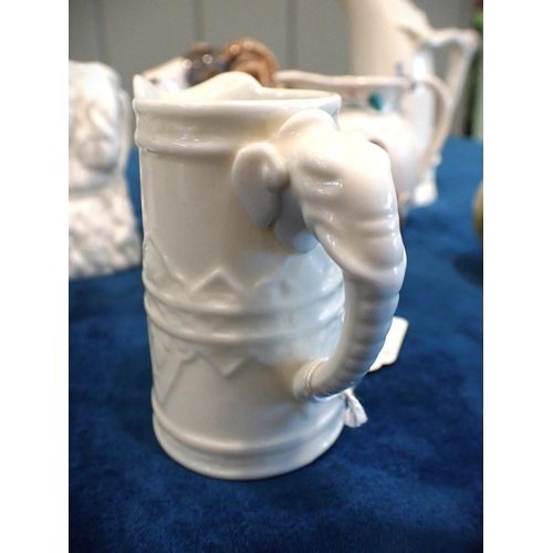 279 - ROYAL WORCESTER MINIATURE ELEPHANT JUG and seven other small jugs (8)