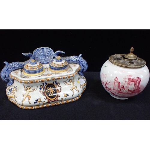 287 - A GIEN POTTERY INKWELL (a/f), and another Continental inkwell with brass mount (a/f) (2)