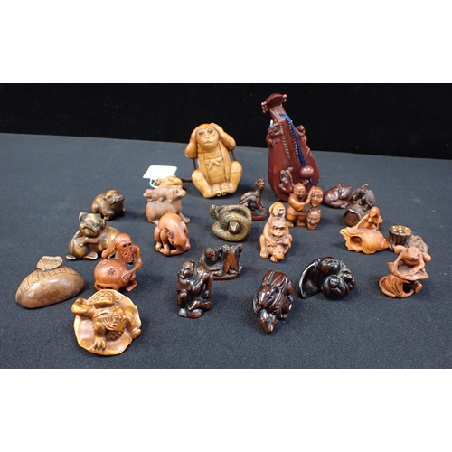 308 - A COLLECTION OF JAPANESE BOXWOOD NETSUKE (19) to include rabbits, pis and tortoise, some signed and ... 