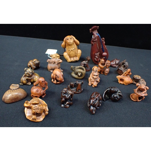 308 - A COLLECTION OF JAPANESE BOXWOOD NETSUKE (19) to include rabbits, pis and tortoise, some signed and ... 