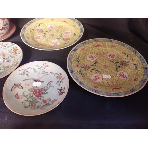 311 - A PAIR OF JARDINIERES AND STANDS with two yellow plates and two other plates (damaged)