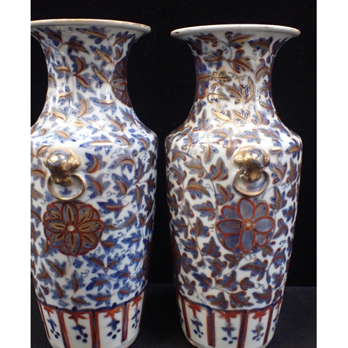 313 - A PAIR OF CHINESE VASES, UNDERGLAZE BLUE WITH 'CLOBBERED' IRON RED and profuse gilding, and ring 'ha... 