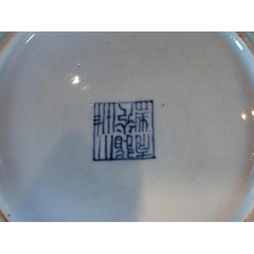 314 - CHINESE BLUE AND WHITE PORCELAIN PILLOW Two celadon plates, two prunus vases,