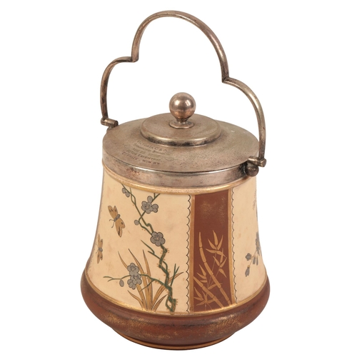 329 - A MACINTYRE POTTERY BISCUIT BARREL 