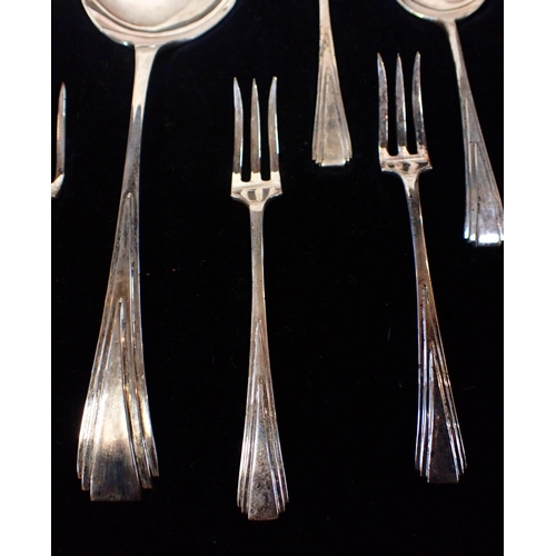 334 - AN ART DECO SILVER-PLATED CASED DESSERT SET consisting of serving spoon six forks and six spoons.