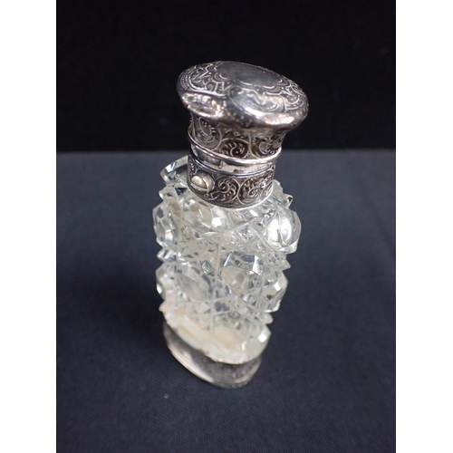 487 - A GROUP OF 19TH CENTURY SCENT BOTTLES one Nailsea type, two double-ended, some silver topped, and a ... 