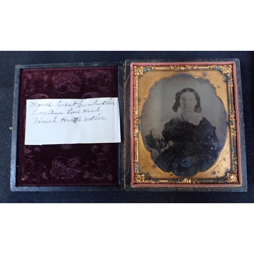 494 - A CASED DAGUERROTYPE PORTRAIT OF AN ELDERLY COUPLE with a cased ambrotype, and an empty case (3)