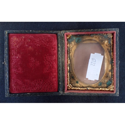 494 - A CASED DAGUERROTYPE PORTRAIT OF AN ELDERLY COUPLE with a cased ambrotype, and an empty case (3)