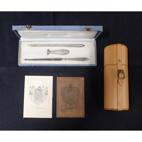 500 - A CASED SLIVER HANDLED PEN, SEAL AND LETTER OPENER with a leather buckled carrying case and a copper... 