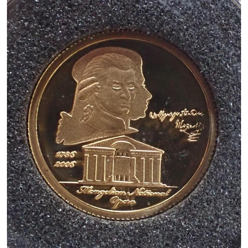 505 - LONDON MINT: A 2006 MOZART 250TH ANNIVERSARY GOLD COIN c.13.92mm diameter, in the original capsule, ... 