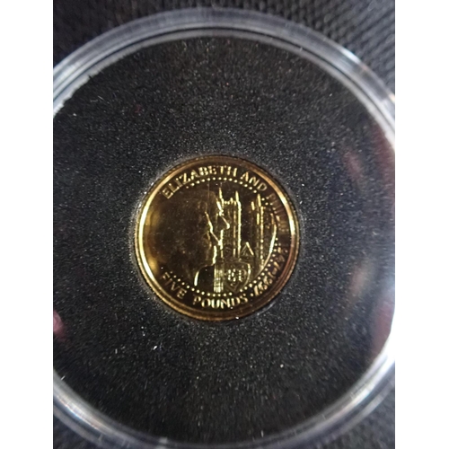 509 - ROYAL MINT: A 1997 GUERNSEY £5 GOLD COIN (c.1.25oz), 13.92mm diameter, in the original capsule with ... 