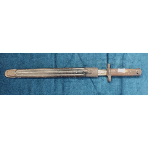 524 - AN OLD BRITISH BAYONET hilt marked G24845 Calcutta, 29cm long, the associated scabbard marked G. Onu... 