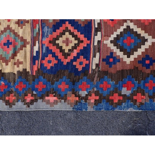 744 - A LARGE ANATOLIAN KILIM, EARLY 20TH CENTURY 187 x 335cm (a/f, worn, patched, unevenly faded)