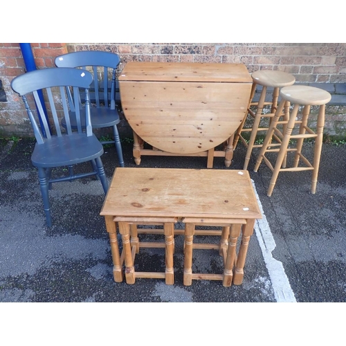 762 - A LOW PINE FOUR DOOR CUPBOARD, A PINE GATELEG TABLE two painted chairs, two bar stools, mirror, and ... 