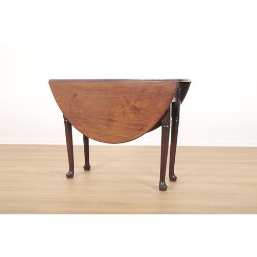 768 - A GEORGE II MAHOGANY DROP LEAF TABLE the oval top above a plain frieze, on tapered legs, with chamfe... 