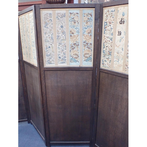 805 - AN OAK FOUR-PANEL SCREEN, WITH CHINESE SILK PIECES to the top section, each panel 172.5 x 60cm (one ... 